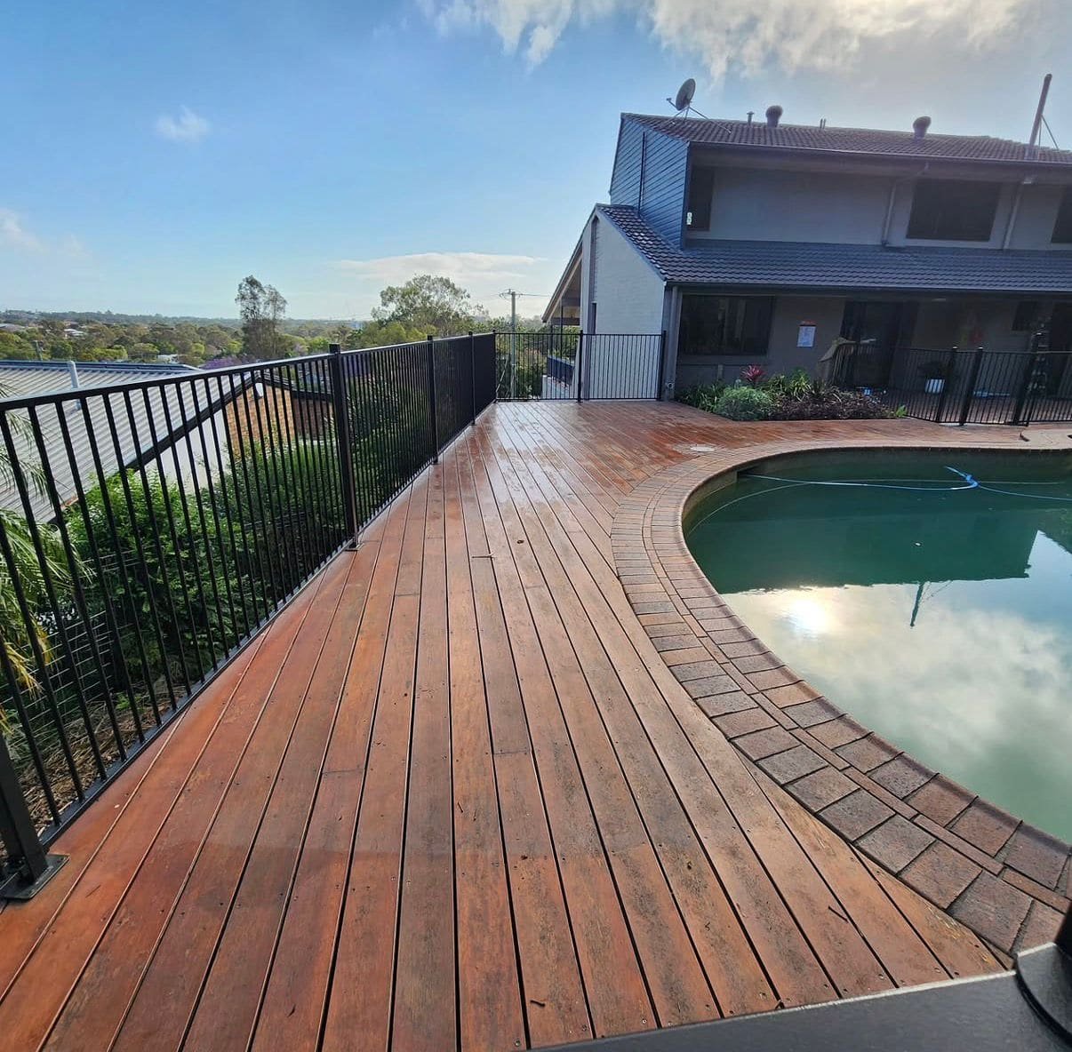 Curved timber pool deck